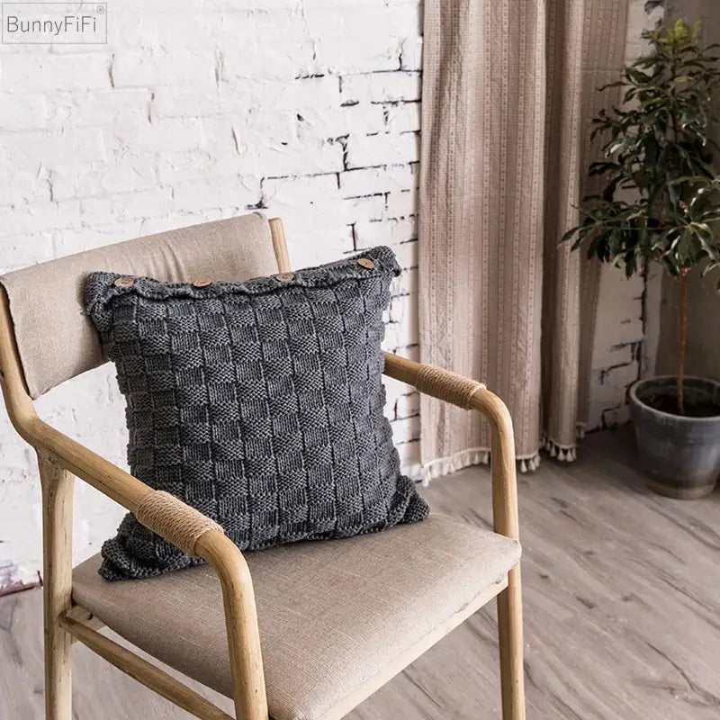 Gray knitted decorbites knit pillow cover with woven texture and wooden button accents for living room decor