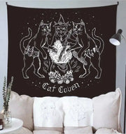Black cat coven tapestry featuring white line-art of three cats around a cauldron for mysterious bedroom wall art