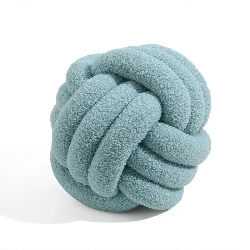 A soft light blue boucle knotted circle rope ball plush fabric decorbites boucle knotted bedroom decor pillow