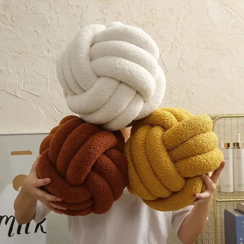 Three plush knotted circle throw pillows in off-white boucle brown and mustard yellow for bedroom decorbites boucle knotted decor
