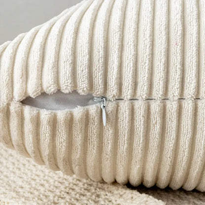 Cream-colored off white ribbed corduroy striped throw pillow cover with visible zipper pull decorbites corduroy striped pillow covers