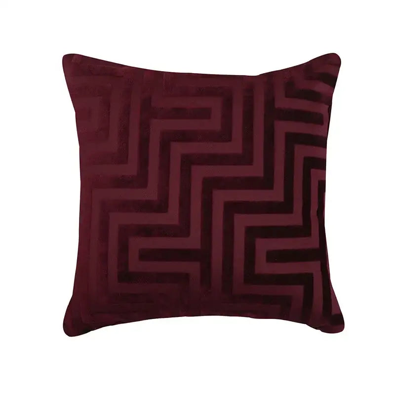 A plush deep burgundy velvet decorbites geometric jacquard throw pillowcase with bold zigzag pattern for living room