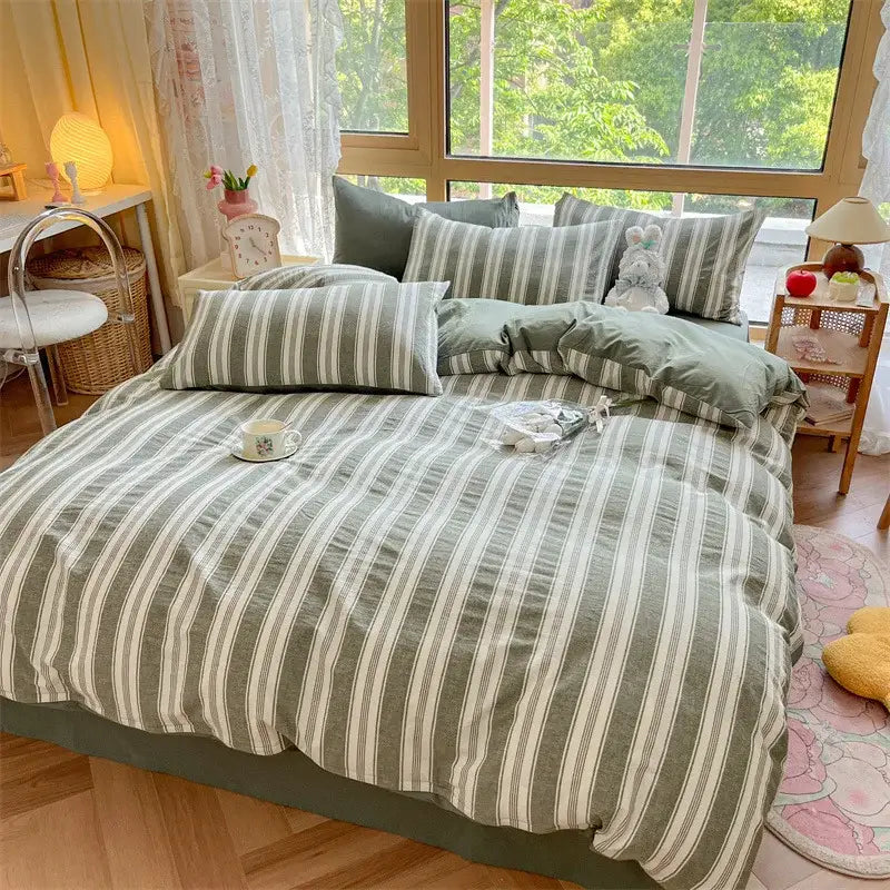Olive and cream cotton striped bedding set with matching pillows by decorbites for stylish bedroom decor