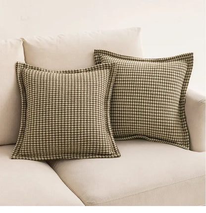 Two olive and cream houndstooth jacquard pillow covers with textured weave for living room cushions by decorbites