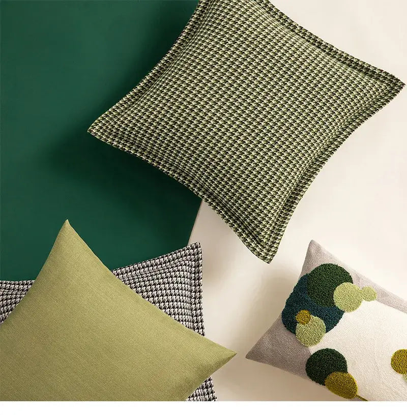 Olive green houndstooth textured throw pillow made of jacquard fabric offering stylish pillow covers and cushion covers by decorbites