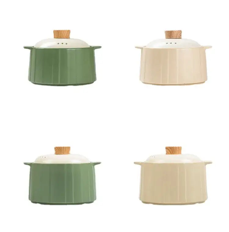 Set of four olive green and white ceramic casserole pots with fluted sides and wooden knobs for gas stove rice use