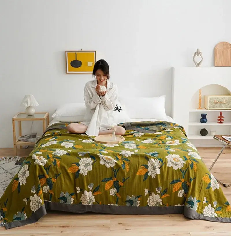 Olive green floral cotton gauze plaid blanket with white and yellow blossoms and solid gray border for decorbites cotton gauze decor