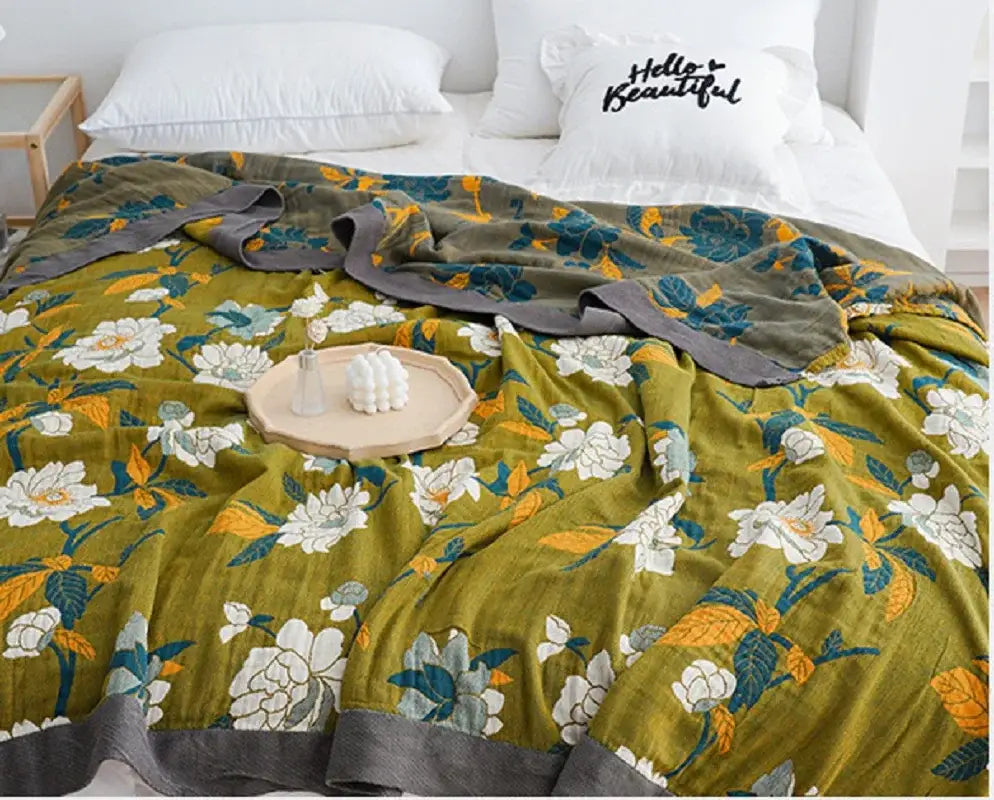 Olive green floral cotton gauze plaid blanket with white yellow and teal blossoms and soft gray trim for bedroom decorbites cotton gauze