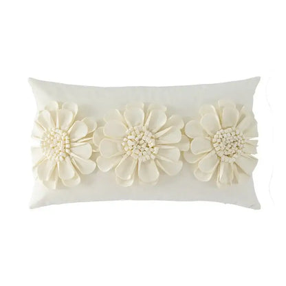 Cream-colored rectangular cushion cover with decorbites handmade flower appliqués for living room decor