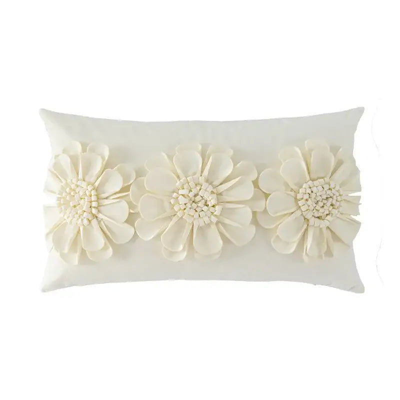 Cream-colored rectangular cushion cover with decorbites handmade flower appliqués for living room decor