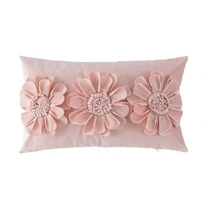 A soft pink handmade flower cushion cover with three dimensional fabric flowers for decorbites living room decor