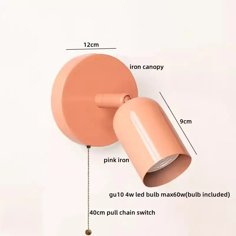 Pink iron wall sconce with 12cm circular canopy and gu10 led bulb featured in decorbites led wall sconce design