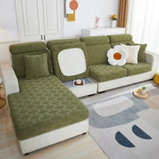 Olive green patterned jacquard sofa seat cover with white square cutout on backrest for living room protector