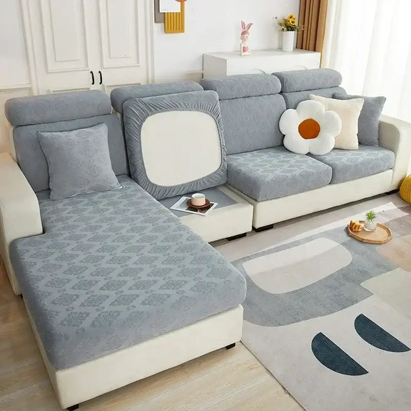 Gray patterned jacquard sofa seat cover with subtle texture snugly fitted for living room seat cover protection