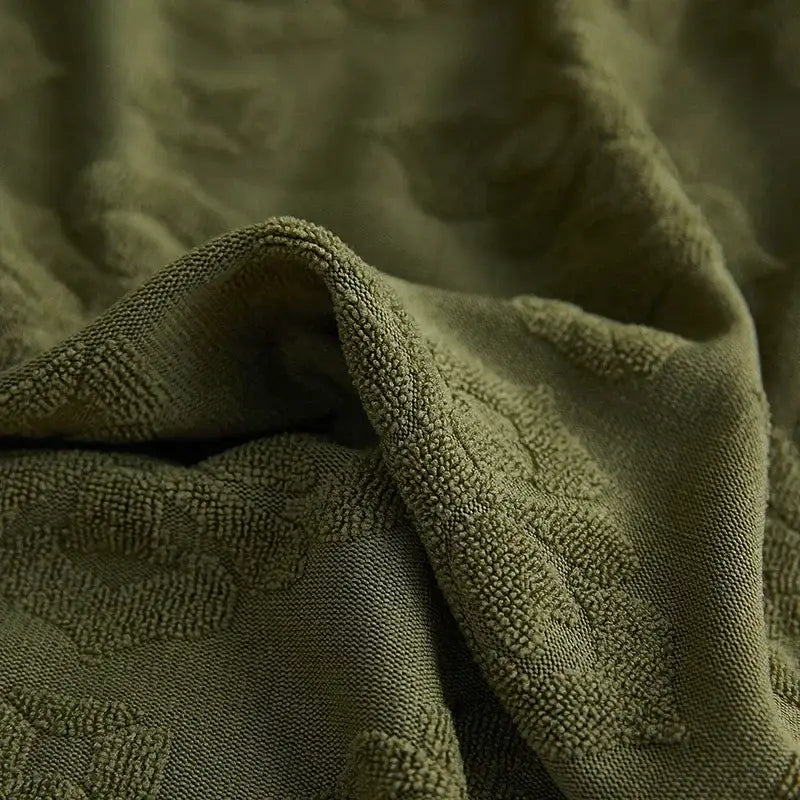 Olive green patterned jacquard sofa seat cover with plush looped weave textured towel fabric for living room protector
