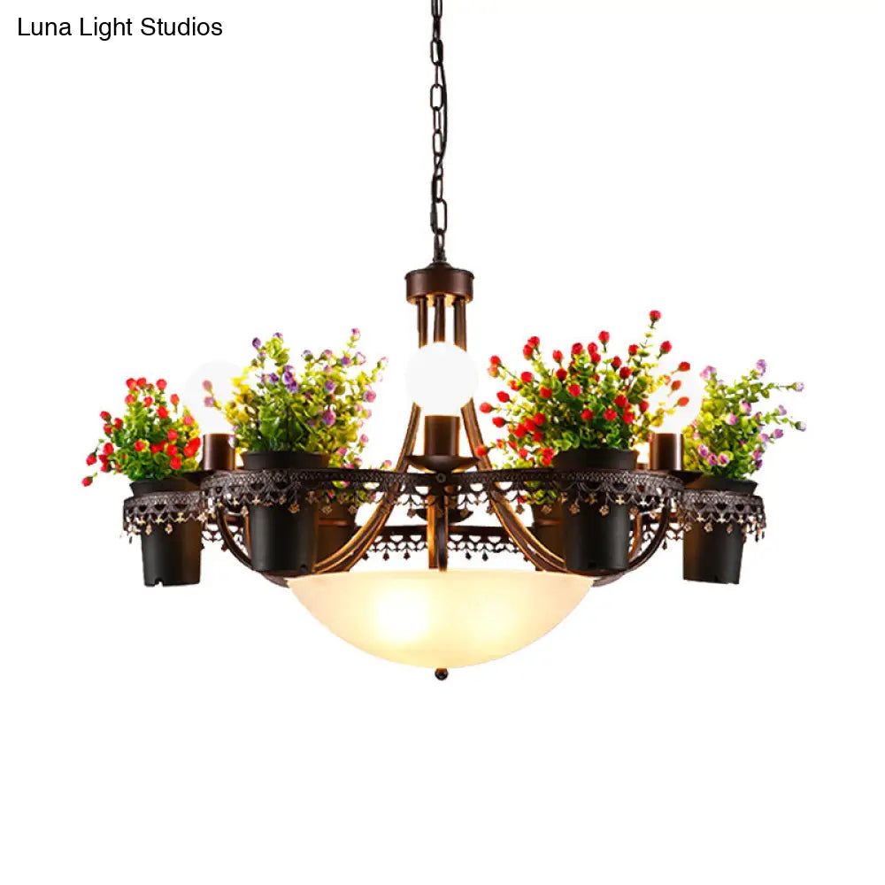 Opal Glass 9-Bulb Pendant Light with Black Bowl Design and Potted Plant