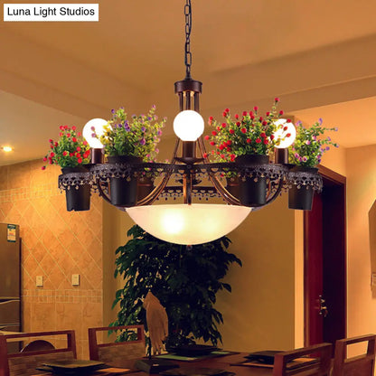 Opal Glass 9-Bulb Pendant Light with Black Bowl Design and Potted Plant