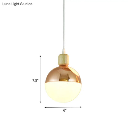 Opal Glass Bedside Pendant Lamp in Modern Gold Sphere Design"

This revised title maintains the essential keywords while being more concise for SEO purposes.