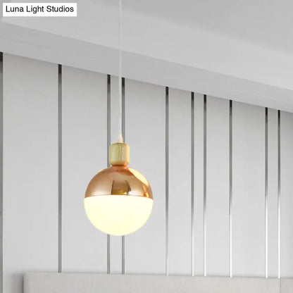 Opal Glass Bedside Pendant Lamp in Modern Gold Sphere Design"

This revised title maintains the essential keywords while being more concise for SEO purposes.