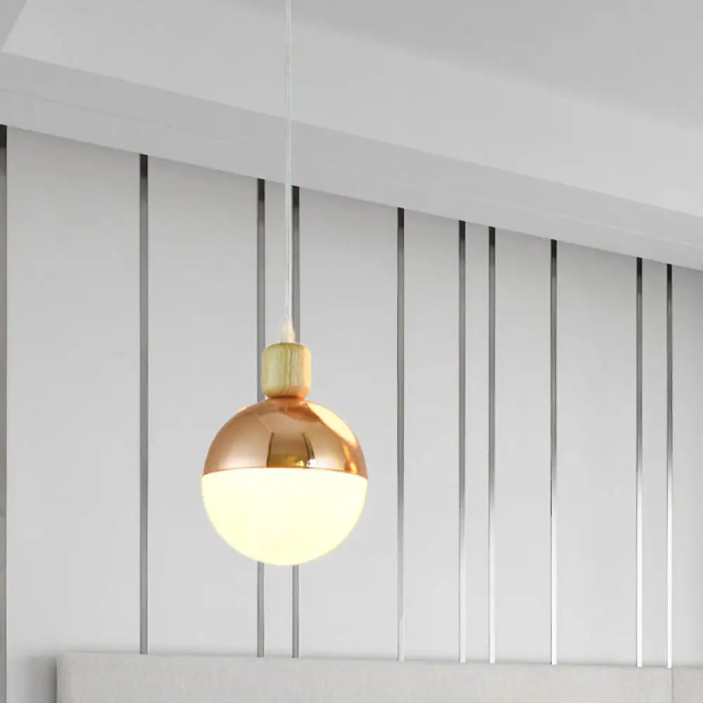 Opal Glass Bedside Pendant Lamp in Modern Gold Sphere Design"

This revised title maintains the essential keywords while being more concise for SEO purposes.