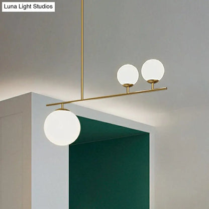 DecorBites™ Opal Glass Globe Pendant Lamp: Elegant 3-Bulb Island Lighting in Gold