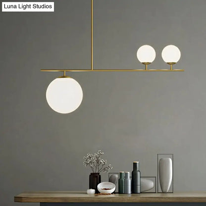 DecorBites™ Opal Glass Globe Pendant Lamp: Elegant 3-Bulb Island Lighting in Gold