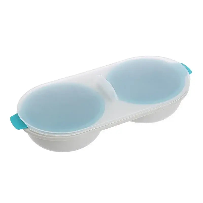 Transparent plastic egg boiler steamer double cup holder with light blue silicone lids and teal handles separator