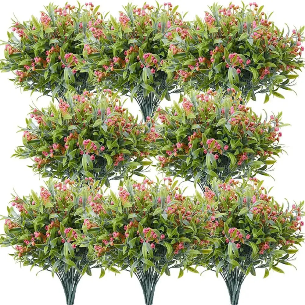 Artificial plant with orange babysbreath lover fruit featuring green synthetic bush and pink blossoms for garden decor