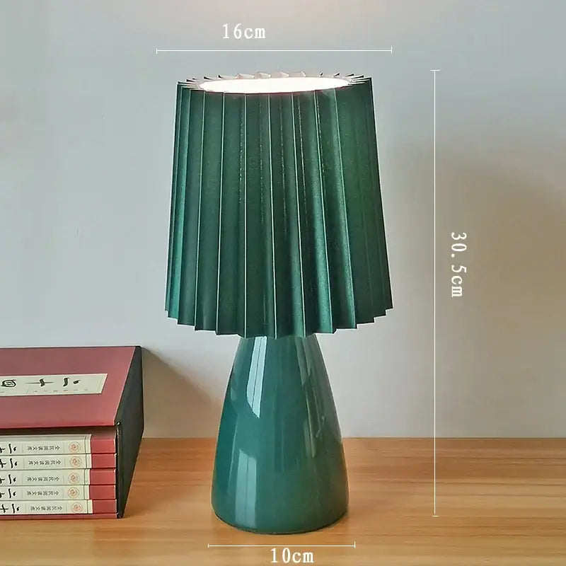 Emerald green ceramic milkshake bedside lamp with pleated shade and tapered base from decorbites ceramic milkshake collection