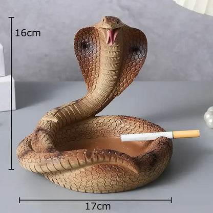 Detailed brown cobra ashtray resin with textured scales and open mouth holding cigarette for office decor by decorbites cobra ashtray