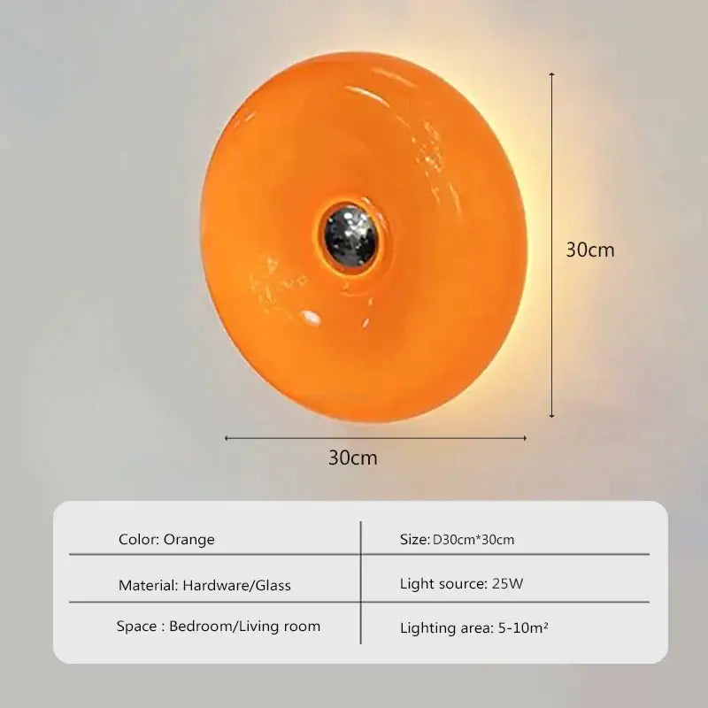 Vibrant orange decorbites glass donut led wall sconce with central metallic fixture for bedroom lighting decor