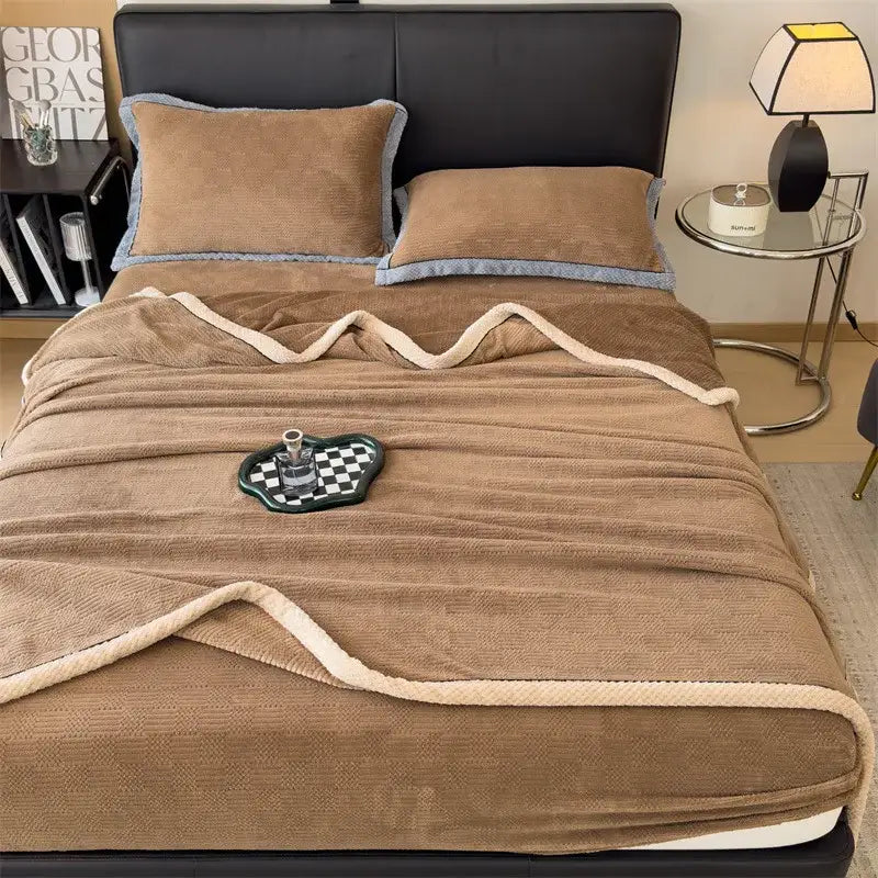 Warm brown plush throw blanket with cream fleece border and textured weave for decorbites carved velvet blanket use