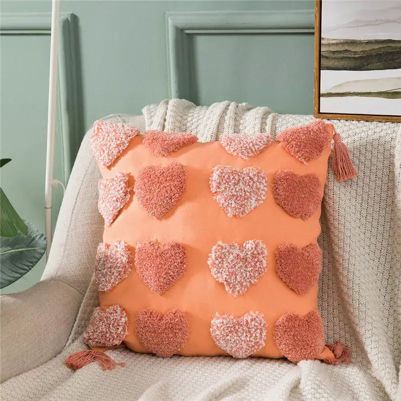 Coral-colored cushion cover with fluffy pink and peach heart embroidery decorbites heart embroidery for living room decor