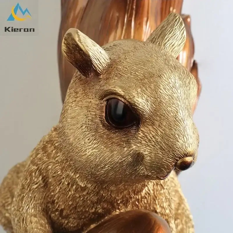 Orange squirrel crystal led wall lamp featuring a golden resin figurine with detailed fur texture and dark glossy eyes decorbites crystal led decor