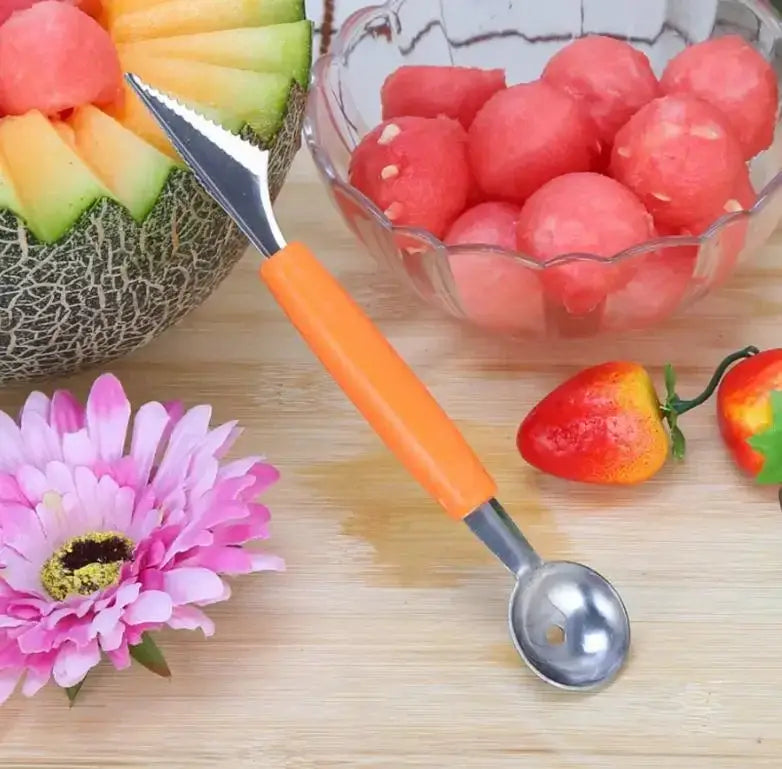 Orange-handled kitchen tool mini ball digger with stainless steel blade and scoop for precise melon balling