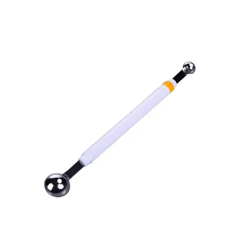 White-handled orange stainless steel mini ball digger kitchen tool with two metallic spherical ends and yellow accent band