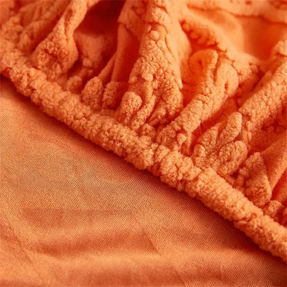 Orange and white jacquard velvet sofa seat cover with plush textured fabric and raised edge pattern for living room protector