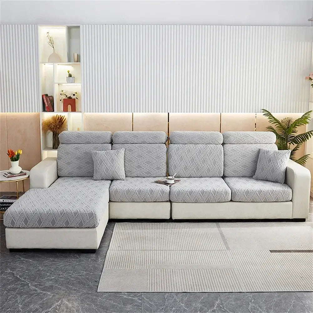 Light gray geometric-patterned sofa seat cover with soft textured fabric for living room sofa seat protection