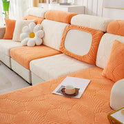 Orange and white leaf jacquard stretch sofa cover with a leaf pattern and white accents for living room protection