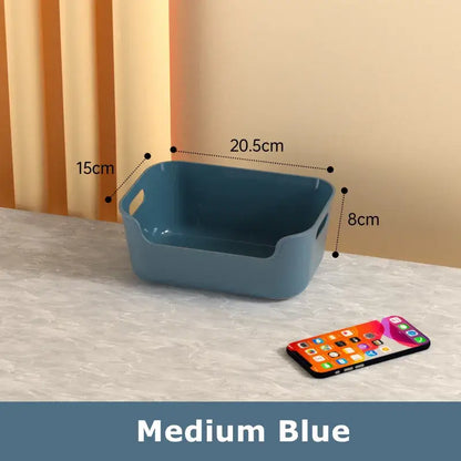 Medium blue rectangular plastic desktop storage basket with integrated side handles for decorbites desktop storage organizer