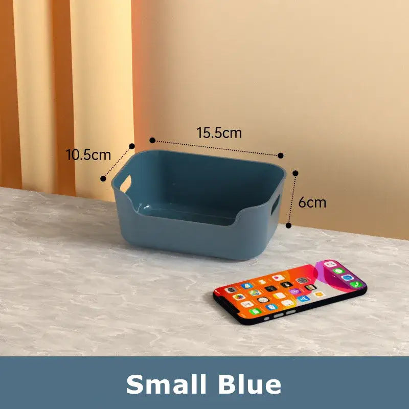 Small blue plastic desktop storage basket with integrated handles for decorbites desktop storage organization