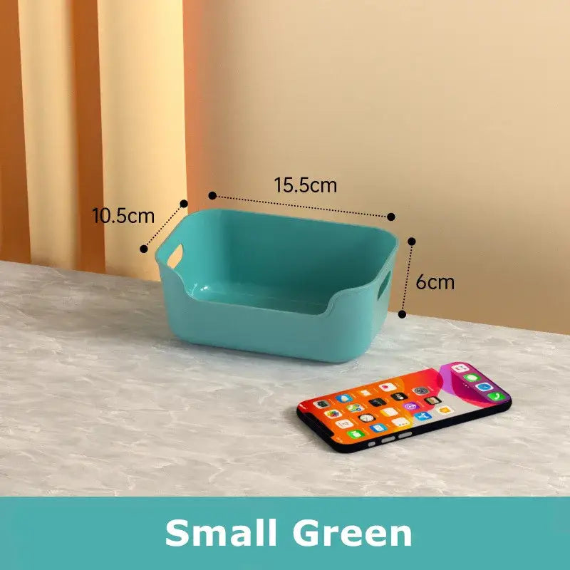 Teal plastic desktop storage basket with integrated handles and rounded corners for decorbites desktop storage box