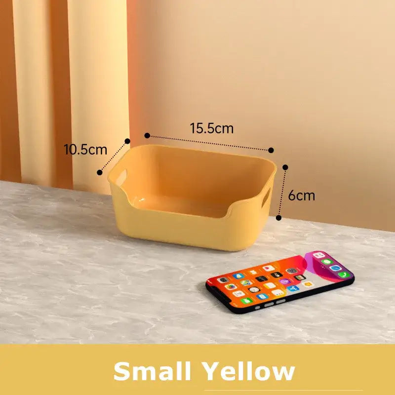 Small yellow rectangular plastic storage box with integrated handles for decorbites desktop storage basket organizer