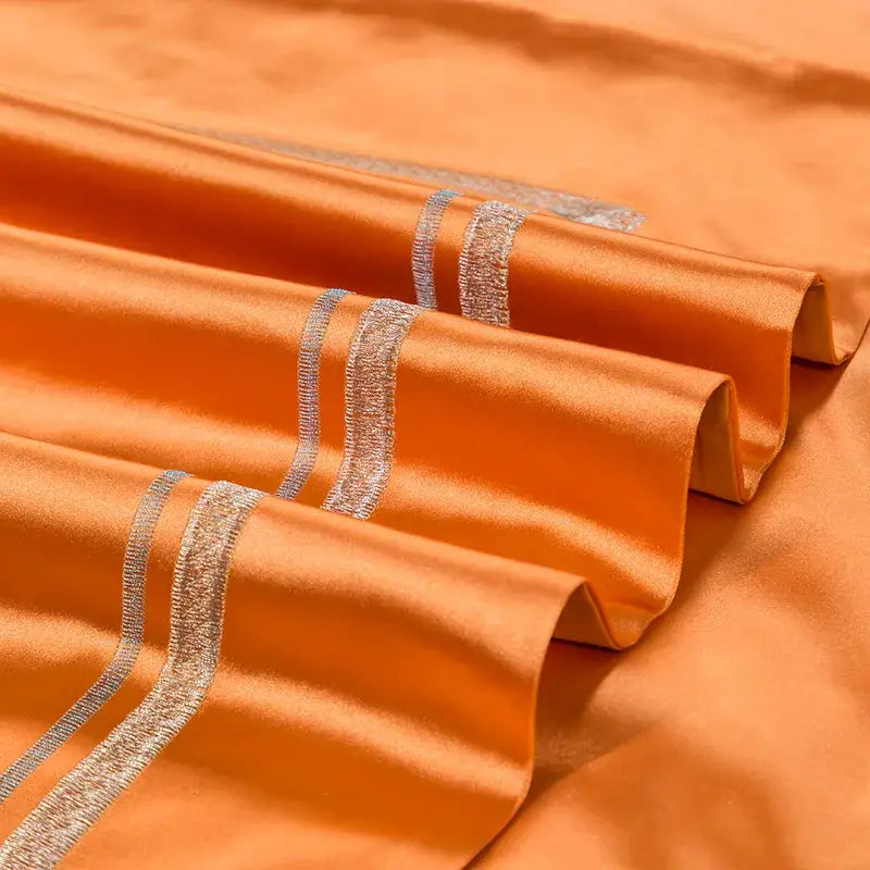 Orange satin fabric with silver metallic stripes in orchid and blue floral 200s embroidery egyptian cotton bedding set