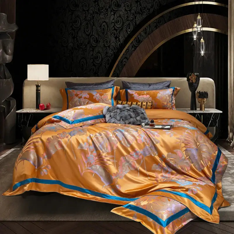 Orchid-patterned satin egyptian cotton silk bedding set in golden orange with teal trim for bedroom use