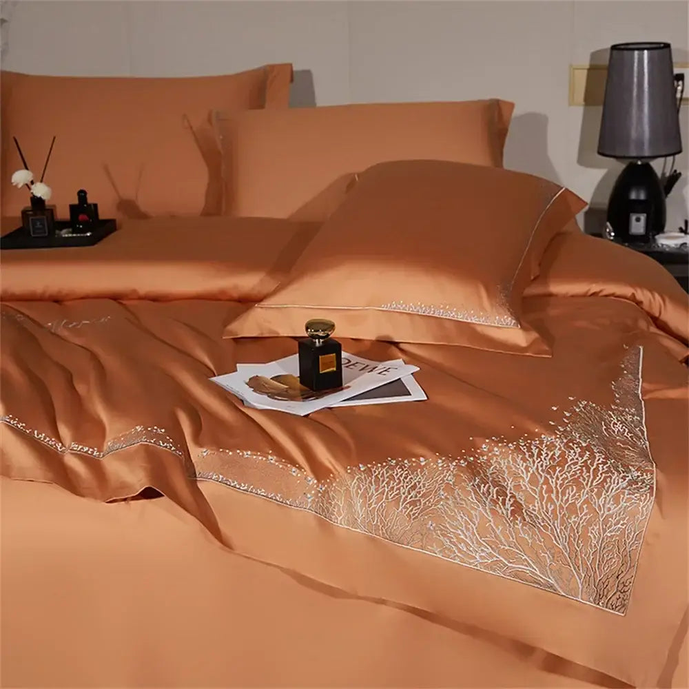 Copper-colored satin egyptian cotton bedding set with silver tree branch decorbites jacquard embroidery along edges