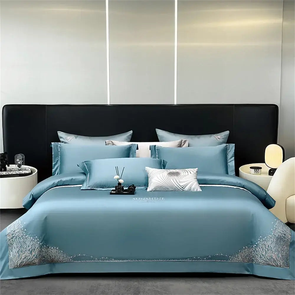 Teal satin bedding set with silver floral jacquard embroidery edges made of egyptian cotton by decorbites