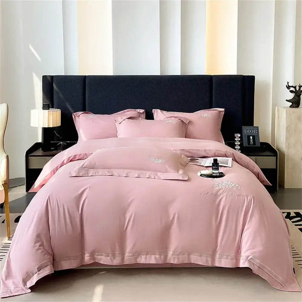 Pink satin bedding set with delicate silver embroidery and subtle sheen in decorbites 1200tc egyptian cotton fabric
