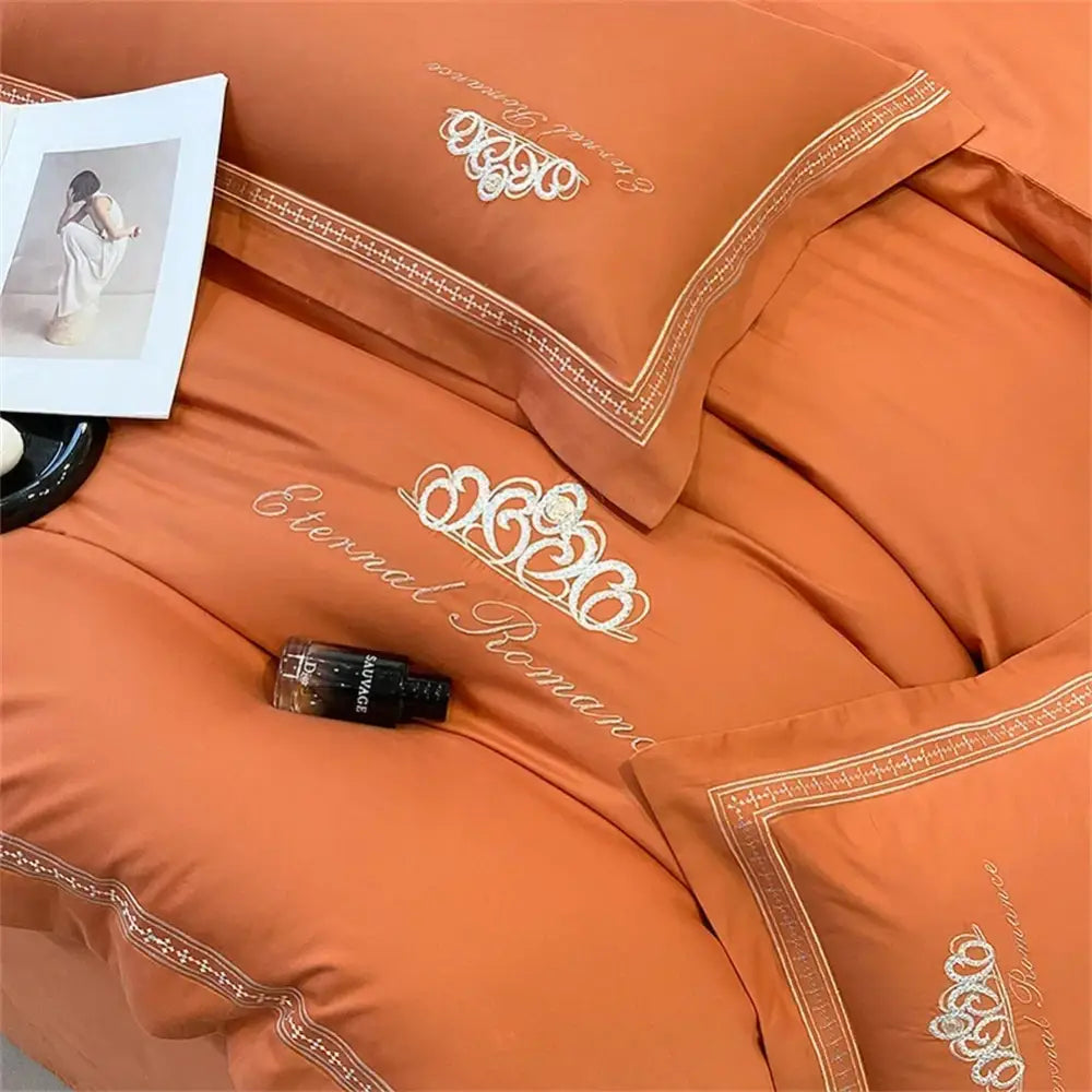 Orchid satin bedding set with gold-threaded embroidery and eternal romance script made from decorbites 1200tc egyptian cotton