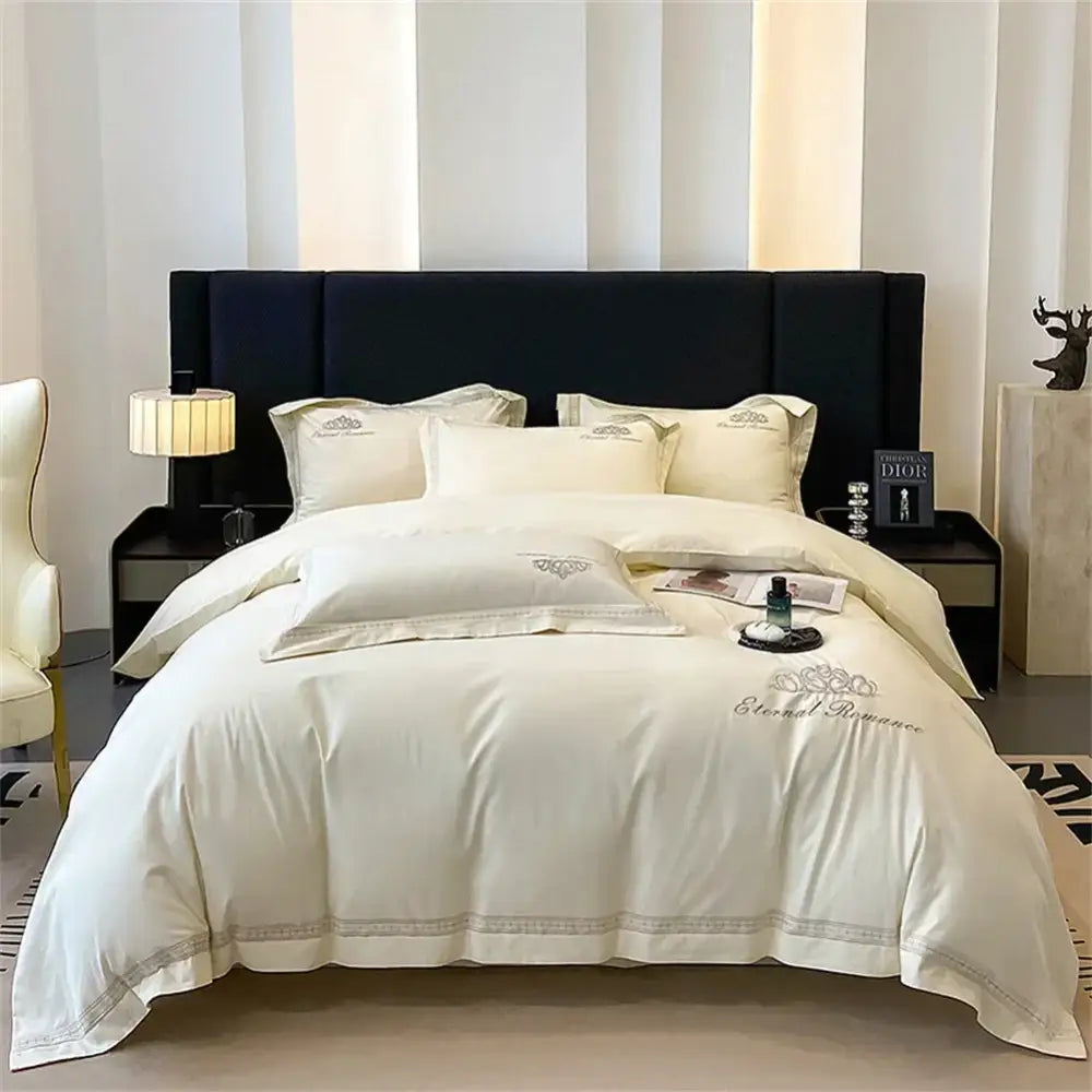 Cream-colored satin bedding set with elegant silver embroidery and eternal romance design in decorbites 1200tc egyptian cotton